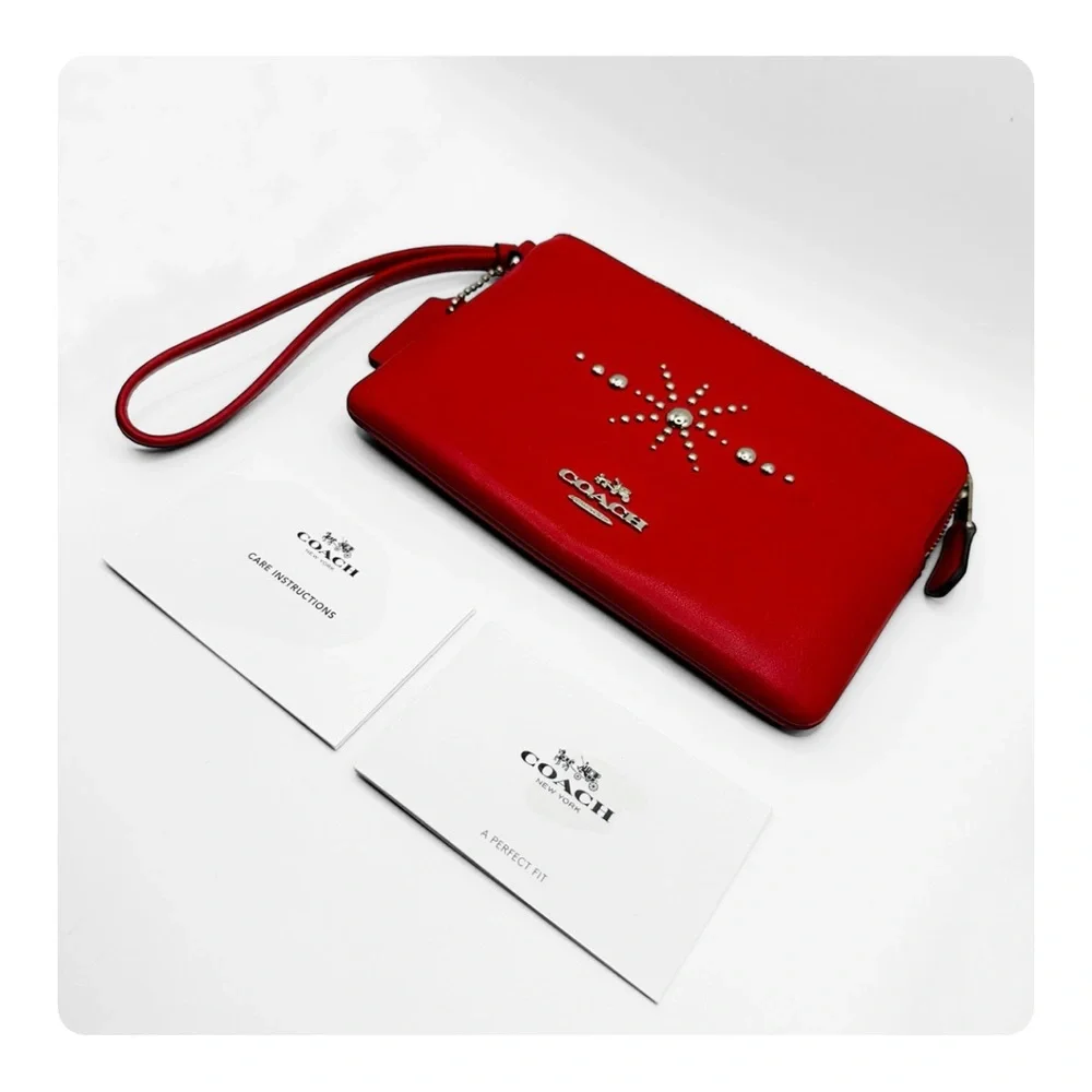 β
Coach RARE Western Rivets Wristlet - Red/Silver β
- Picture 5 of 16